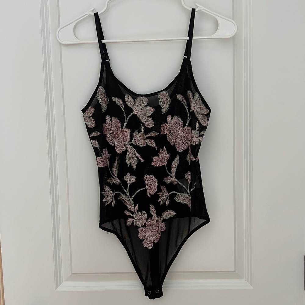Express black and pink floral embroidered bodysuit. Used.